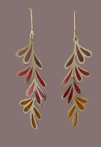 Gold and red leaf-shaped earrings on a white card with 'Muro Jewelry' branding.