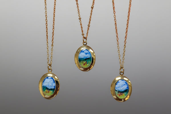 Hand Painted Landscape Locket – Gold-Plated with Clear Enamel
