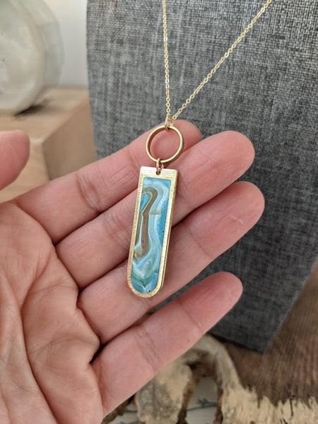 Marbella Blue Swirl Arch Brass Necklace
