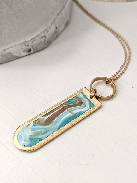 Marbella Blue Swirl Arch Brass Necklace